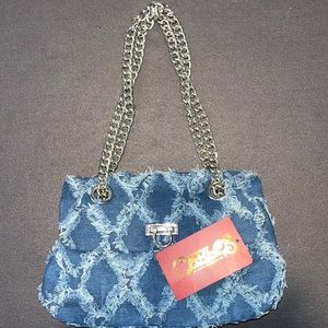 Carlos Santana Denim Fringe Silver Chain Satchel